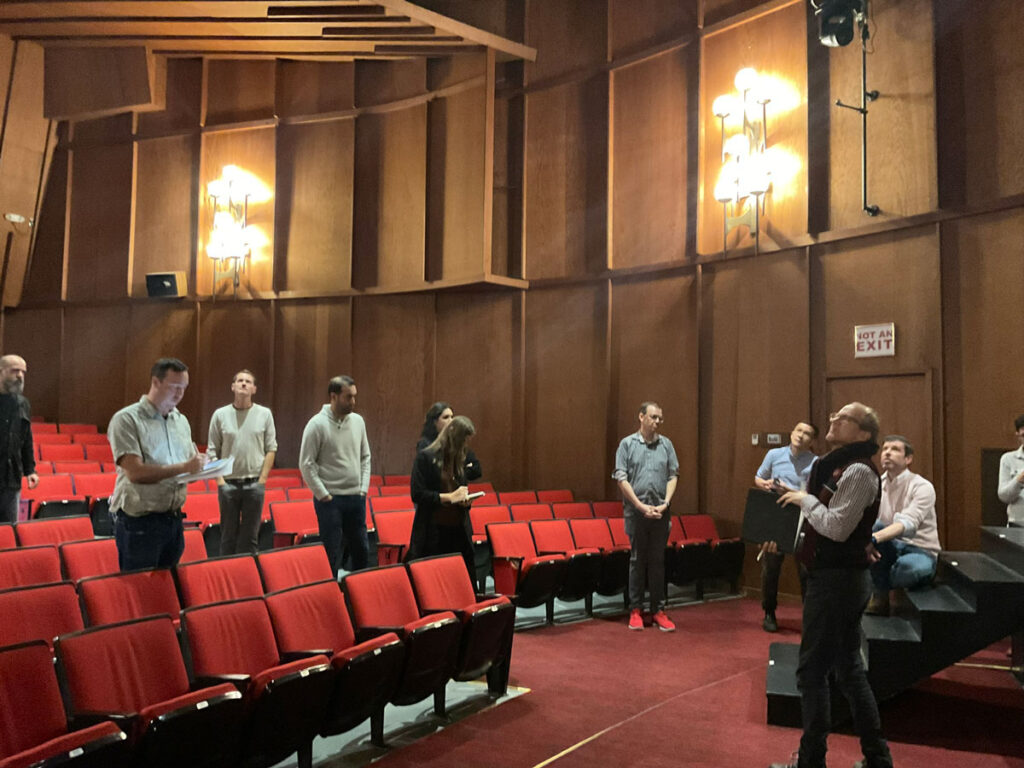 People examine the theater.